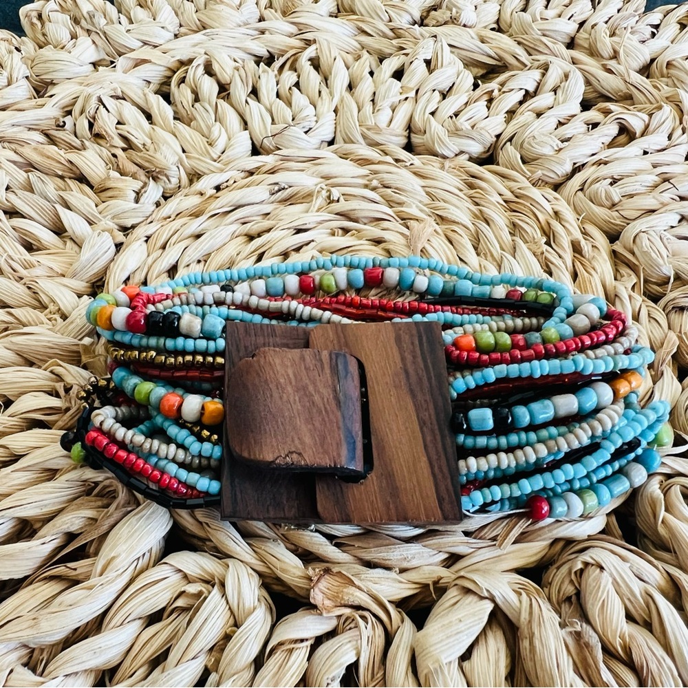 Multi Strand Glass Bead Handmade Bracelet with Monkey Pod Wooden Clasp